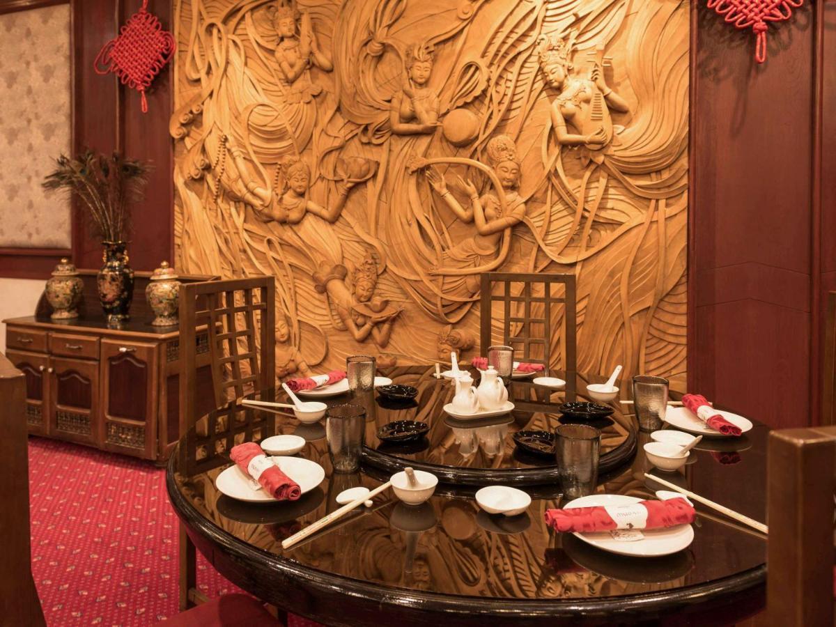 Hotel Mercure Alger Aeroport Dar el Beïda Kültér fotó A table set for dim sum
