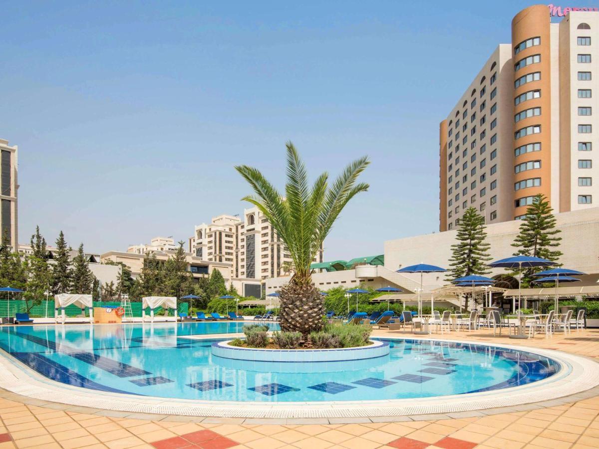 Hotel Mercure Alger Aeroport Dar el Beïda Kültér fotó The pool at the hotel