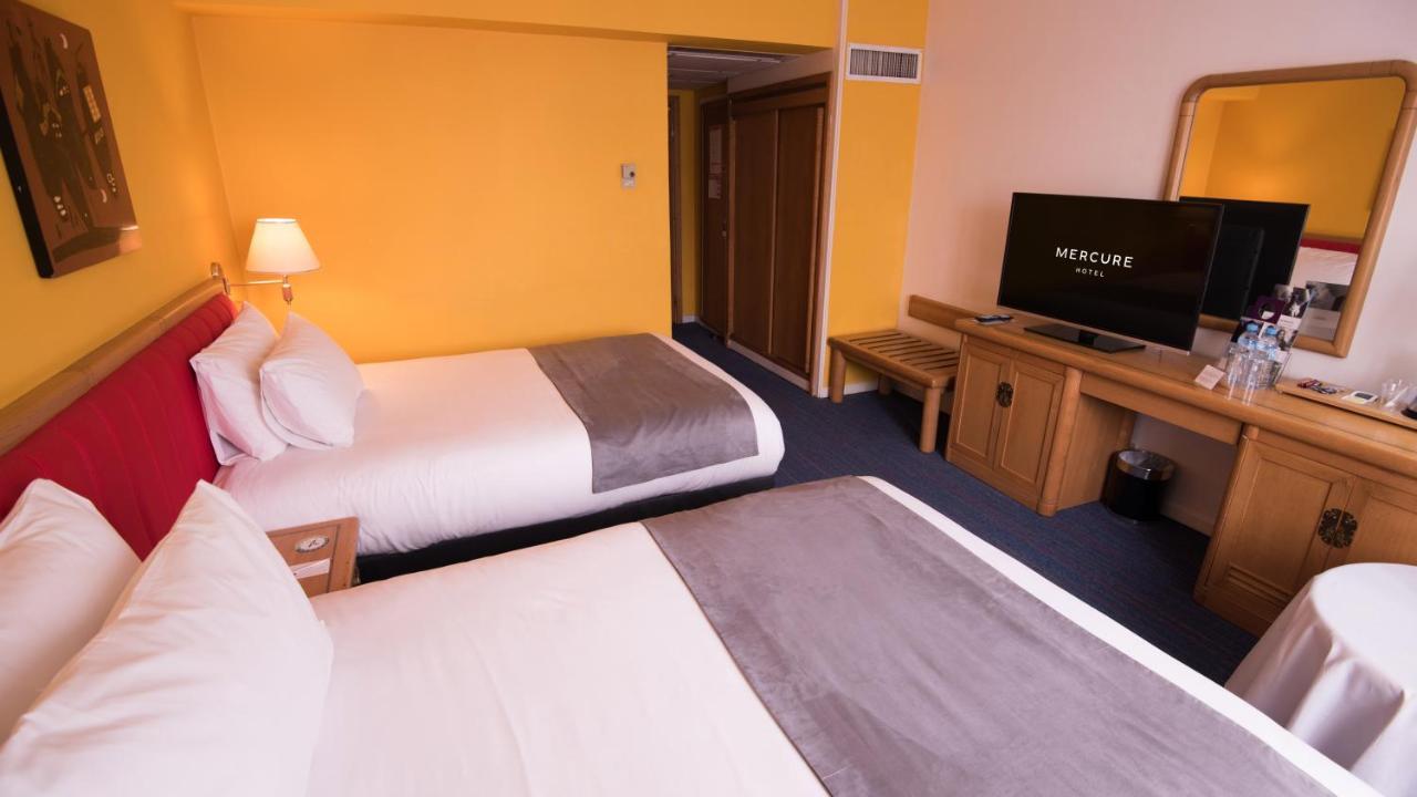 Hotel Mercure Alger Aeroport Dar el Beïda Kültér fotó A typical room at a Mercure hotel
