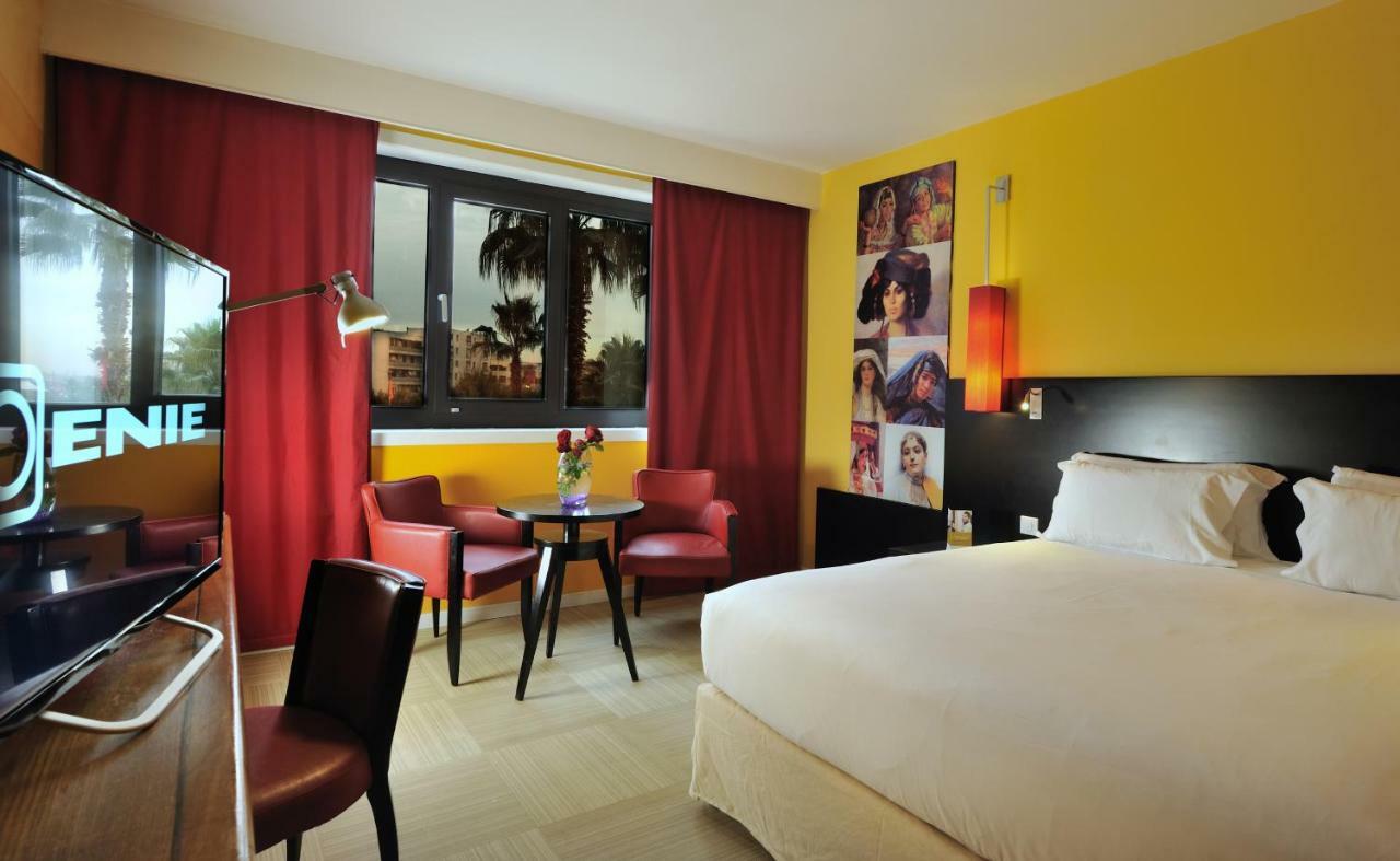 Hotel Mercure Alger Aeroport Dar el Beïda Kültér fotó A room at the hotel